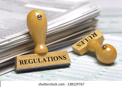 rules and regulations marked on rubber stamp - Shutterstock ID 138129767