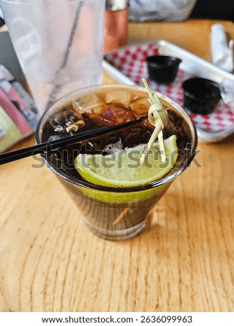 A rum and coke drink
