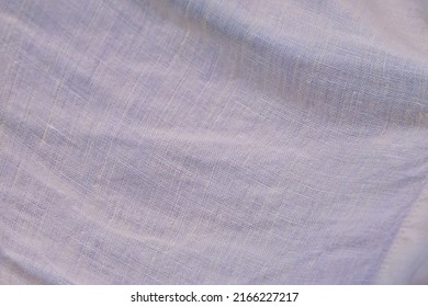 Rumpled Yellow Linen Fabric With Folds