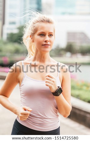 I run because I really like it. Fitness girl having workout outdoors