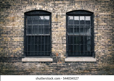 Run Down, Back Alley Wall With Old Windows, Bars And Dirty Glass - Minneapolis, Minnesota.