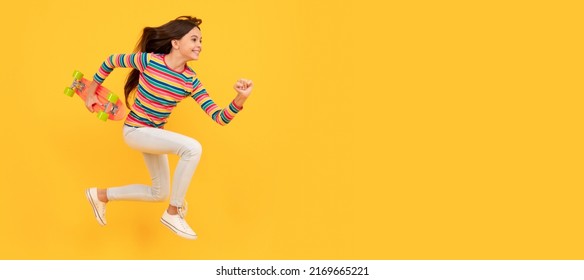 Run And Jump. Happy Energetic Teen Girl Skateboarder Jumping With Penny Board Skateboard, Pennyboard. Casual Teen Child Horizontal Poster. Banner Header, Copy Space.