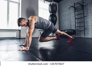 Run As You Breath. The Athlete Trains Hard His Lower And Upper Body In The Gym, Doing Exercises For Calves And Glutes. Push-up And Press-up, Work Out. Fitness, Healthy Life And Self-control Concept.