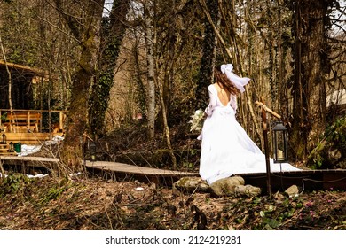 Runaway Bride In White Dress With Open Back .Wedding Concept.