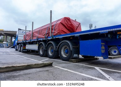 Runcorn, Cheshire / UK - October 01 2019: Illustrative Editorial, WS Transportation Scania View of a Sheeted Load of Steel Tubing taken from the Rear Nearside Quarter of the Semi Trailer T240.