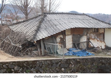 Rundown traditional farmhouse in Korean countryside