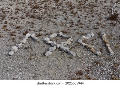 Runic Inscription Of Small Gray And Beige Stones