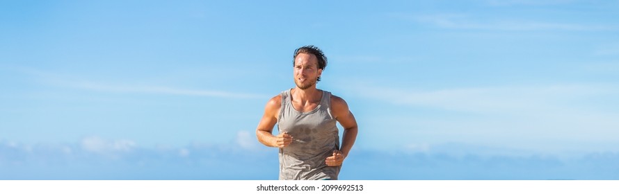 Runner Athlete Man Running Outside For Cardio Exercise Training Hiit Workout Banner Panoramic On Blue Sky Background.