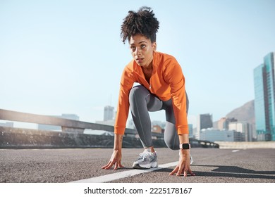 Runner, black woman and street for race, start or sprint in exercise, workout and training in city. Woman, focus and running for fitness, sport and health on road, metro or urban town in sunshine - Powered by Shutterstock