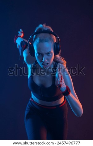 Runner concept. Sprinter run. Strong athletic woman runs on black background wearing in the sportswear. Fitness and sport motivation. Download running Social Media Template