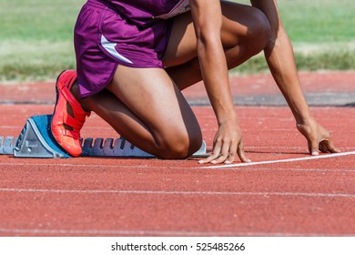 Runner Feet On Track -sprint Start In Track.