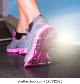 Runner Feet Running In Fitness Room Closeup On Shoe. Woman Fitness 