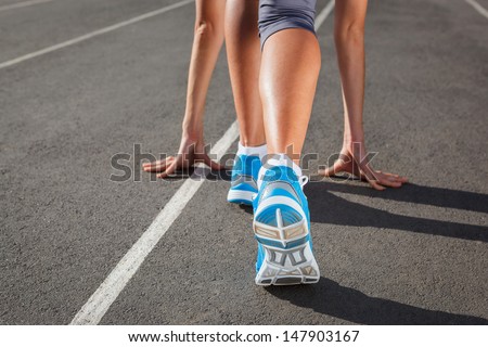 Runner Feet Running on Stadium Closeup - outdoor shot