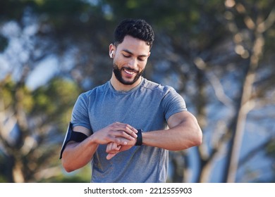 Runner with fitness smart watch, app and check running time for health tracking tech on nature run. Sports athlete doing workout practice for cardio wellness, physical fitness and marathon training - Shutterstock ID 2212555903