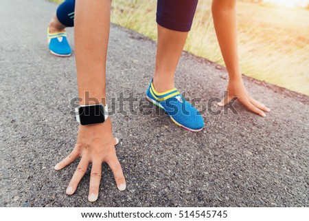 runner gesture ready start to run on road
