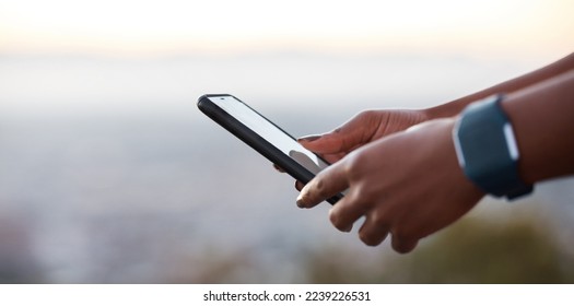 Runner hands, phone and smartwatch for fitness, health or heart rate at training in urban, metro or park. Closeup, smartphone or communication on web app, social media or reading for wellness on rest - Powered by Shutterstock