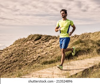 Runner Man Training On The Beach