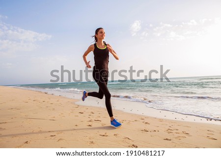 Runner on the beach at dawn. 