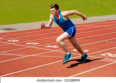 Runner On The Track At A Sport Stadium