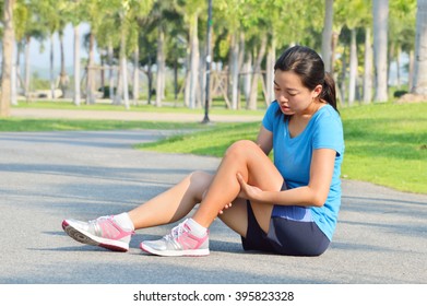 Runner Sport Knee Injury,Woman In Pain While Running In Park