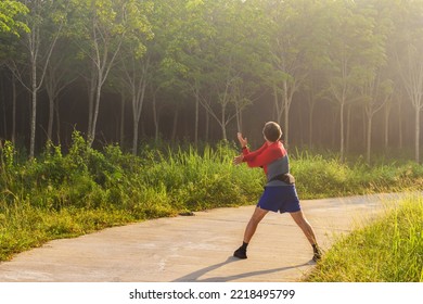 A Runner Streching Before Start Running, Morning Outdoor Activity