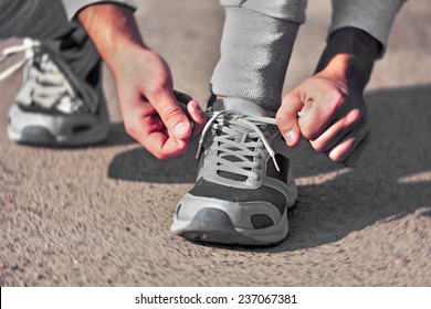 Runner Tying Shoelaces