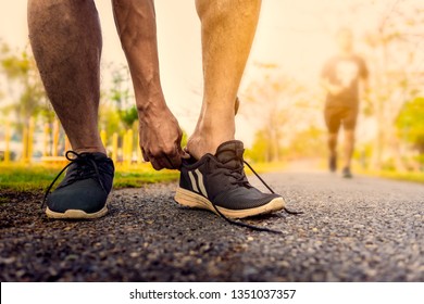 Man Tying Jogging Shoesa Person Running Stock Photo (Edit Now) 358002854