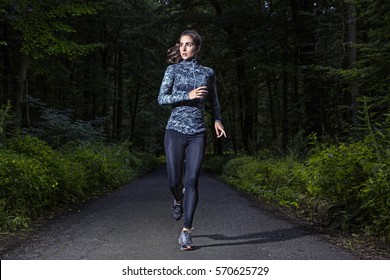 Runner Woman In A Dark Forest