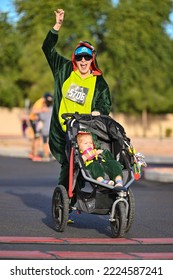 Runners Cross The Finish Line At The Halloween-inspired Brew HaHa 5k Race On Oct. 30, 2022.