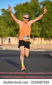 Runners Cross The Finish Line At The Halloween-inspired Brew HaHa 5k Race On Oct. 30, 2022.