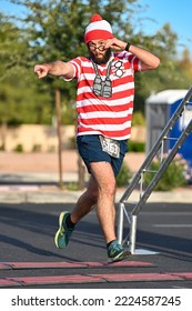 Runners Cross The Finish Line At The Halloween-inspired Brew HaHa 5k Race On Oct. 30, 2022.