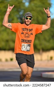 Runners Cross The Finish Line At The Halloween-inspired Brew HaHa 5k Race On Oct. 30, 2022.