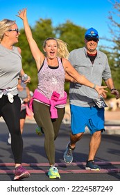 Runners Cross The Finish Line At The Halloween-inspired Brew HaHa 5k Race On Oct. 30, 2022.