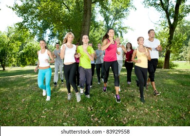 Runners, Jogging Group In Park