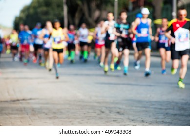runners in marathon abstract, blurry - Shutterstock ID 409043308