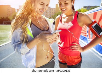 Runners On The Stadium Track. Women Summer Fitness Workout. Jogging, Sport, Healthy Active Lifestyle And Friendship Concept