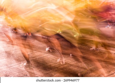 Runners Running In City Marathon, Motion Blur On Sporty Legs