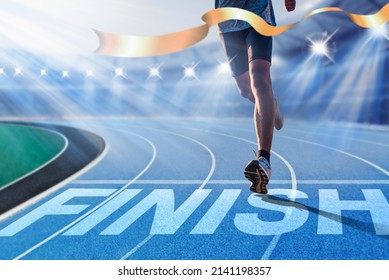 Runners running towards the finish line. Success concept. - Shutterstock ID 2141198357