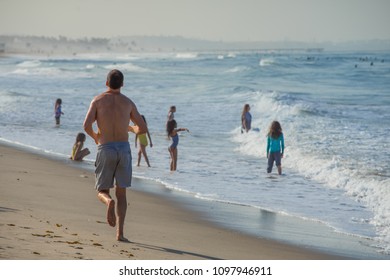 Running Along The Beach At Santa Monica Beach