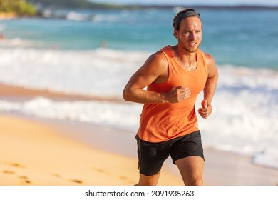 Running Athlete Man On Beach Sweating Training Cardio On Intense Hiit Workout In Summer Temperature. Male Runner Active Sport Lifestyle.