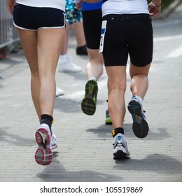 Running Athletes At A Footrace