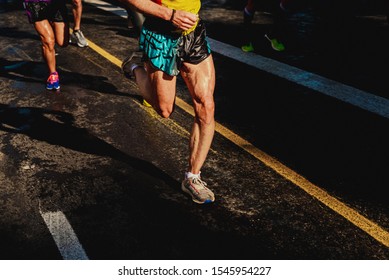 Running athletes have powerful quadriceps and calf muscles for running on asphalt.