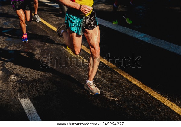 Running athletes have powerful quadriceps and\
calf muscles for running on\
asphalt.
