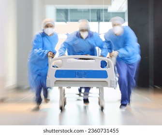 Running, bed and surgeon team, healthcare expert or group speed for surgery support, emergency services or medical help. Wellness, fast motion blur and doctors rush patient for first aid teamwork