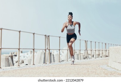 Running, Black Woman And Beach Marathon Training, Fitness And Wellness For Sports Goals, Body Motivation And Energy Outdoors. Focus, Speed And Cardio Runner Athlete, Ocean Exercise And Summer Workout