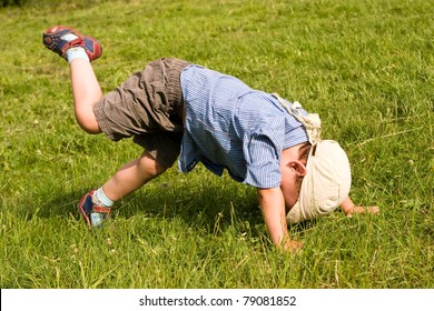 Running Boy Fall Down In Park