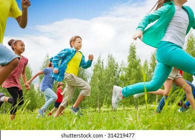 Running Children View In The Green Field