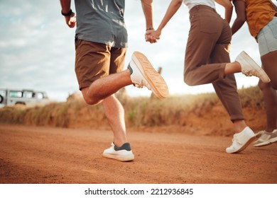 Running, Feet And Friends Holding Hands On Holiday In The Countryside Of Italy Together. Legs Of Group Of People Playing On A Run With Support, Freedom And Adventure On A Road Trip In Nature