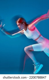 Running Female Athlete On Blue Backdrop. Long Exposure, Motion Blur. Sports Girl Runner Sprinting. Goals Achievement