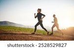 Running, fitness and couple on mountain for exercise, marathon training and workout in morning. Sports, dating and man and woman in nature, outdoors and trail for performance, endurance and wellness